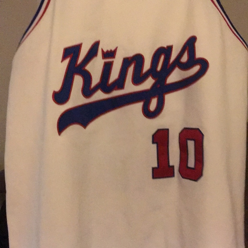 56 2X white red and blue basketball jersey.
